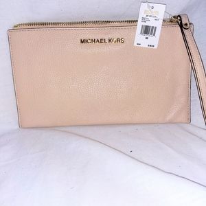 Michael Kors Jet Set large zip clutch